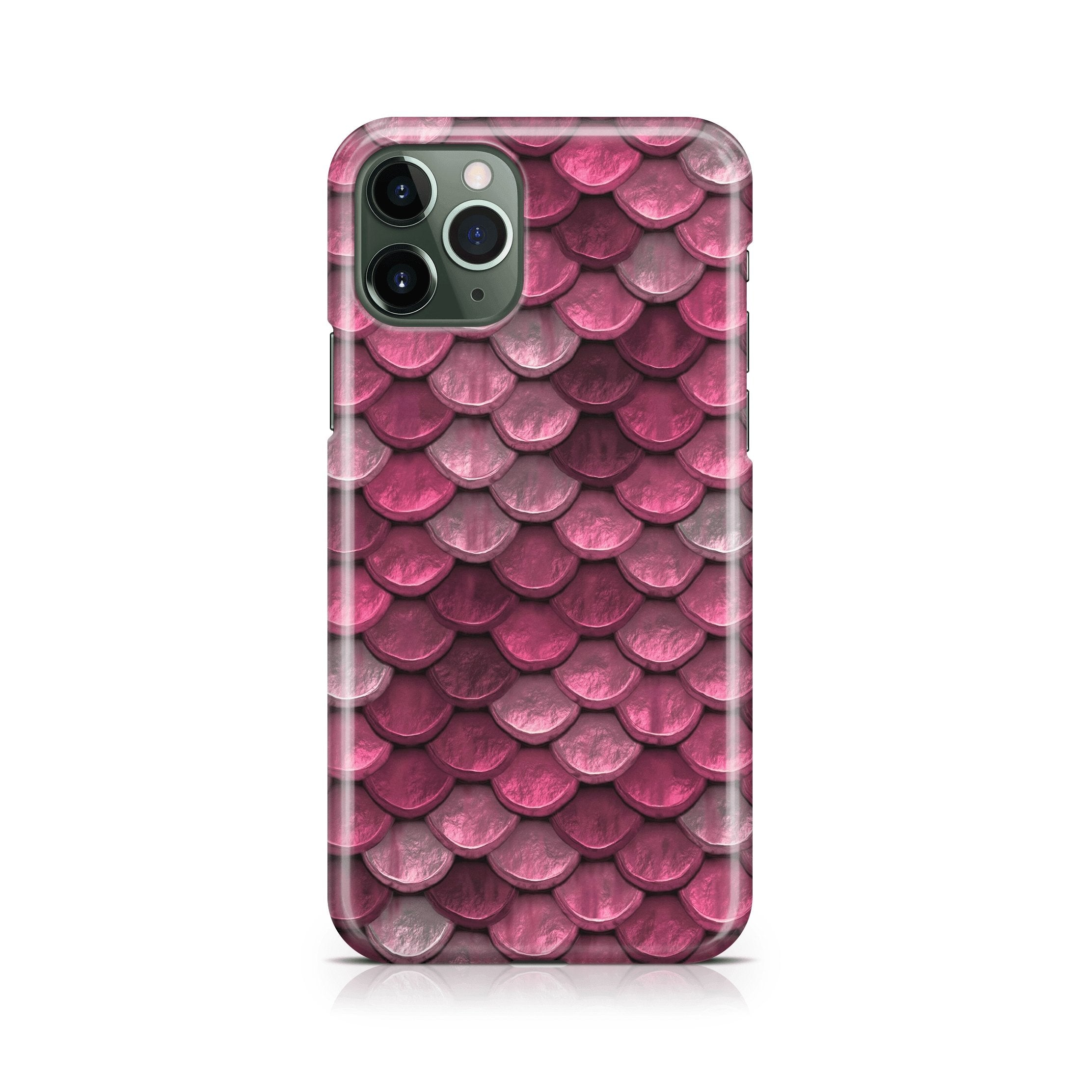 Phone case with pink and purple scale pattern on a white background