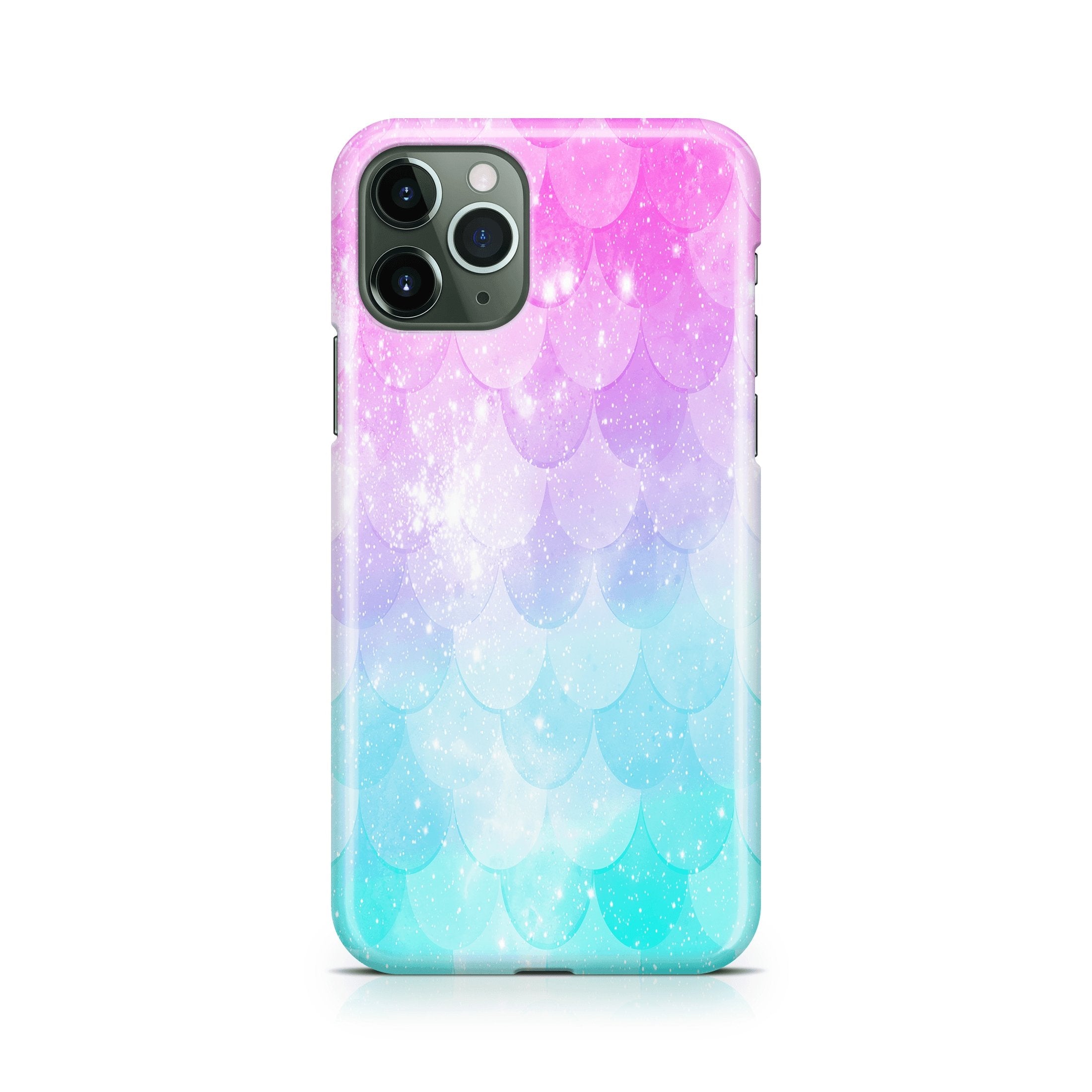 Phone case with a gradient design transitioning from pink to blue mermaid scale pattern on a white background