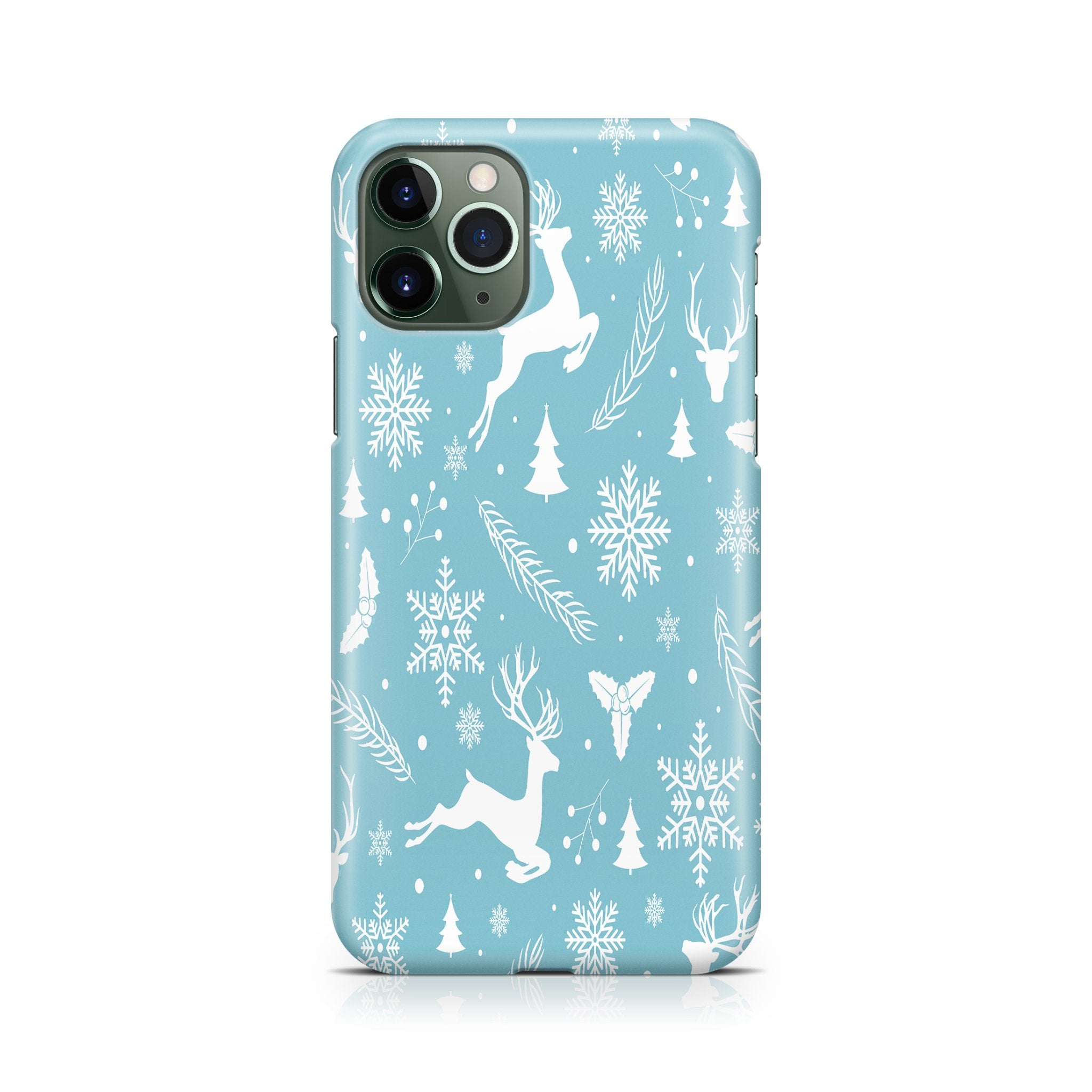 Phone case with winter design featuring deer, snowflakes, and trees on a blue background