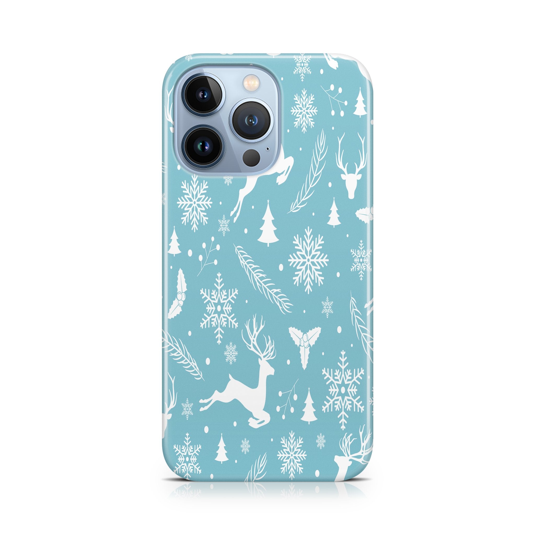Phone case with winter design featuring deer, snowflakes, and trees on a blue background